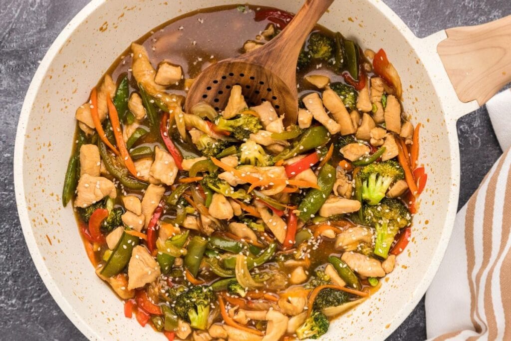 Garlic chicken stir fry in a pan.