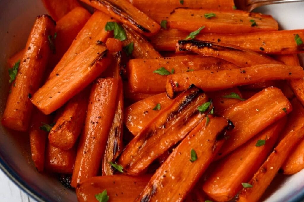 Roasted carrots in a bowl.