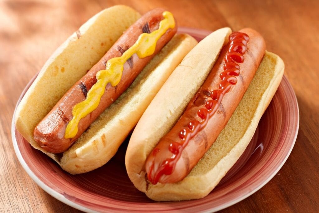Hot dogs in buns.