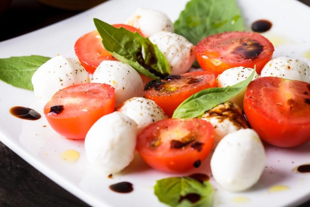 Caprese salad on a plate.