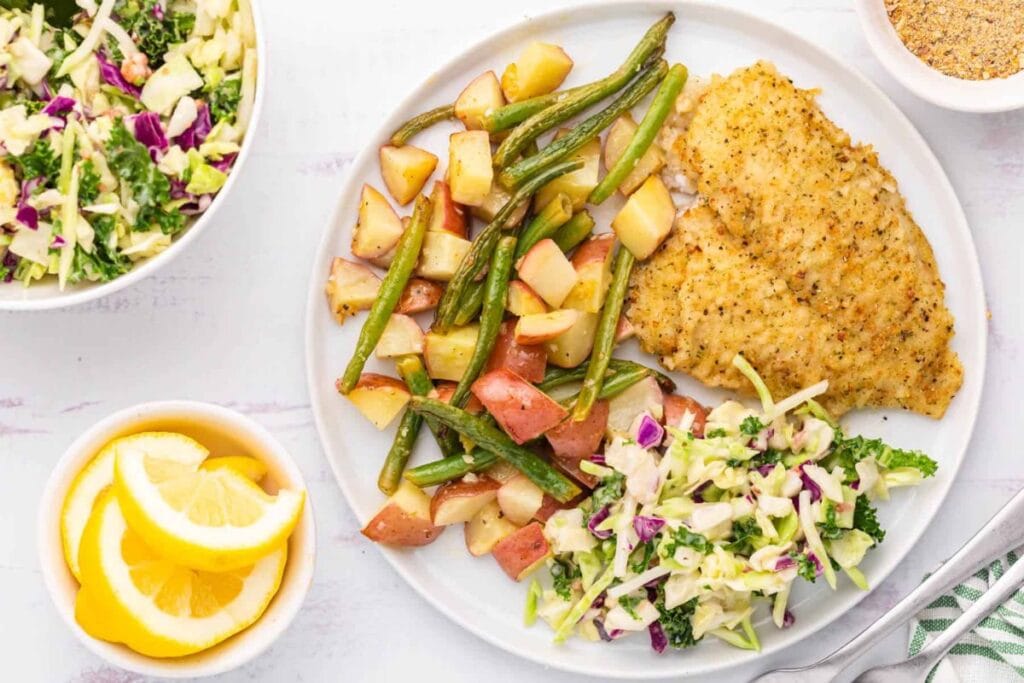 Lemon pepper sole on a plate.