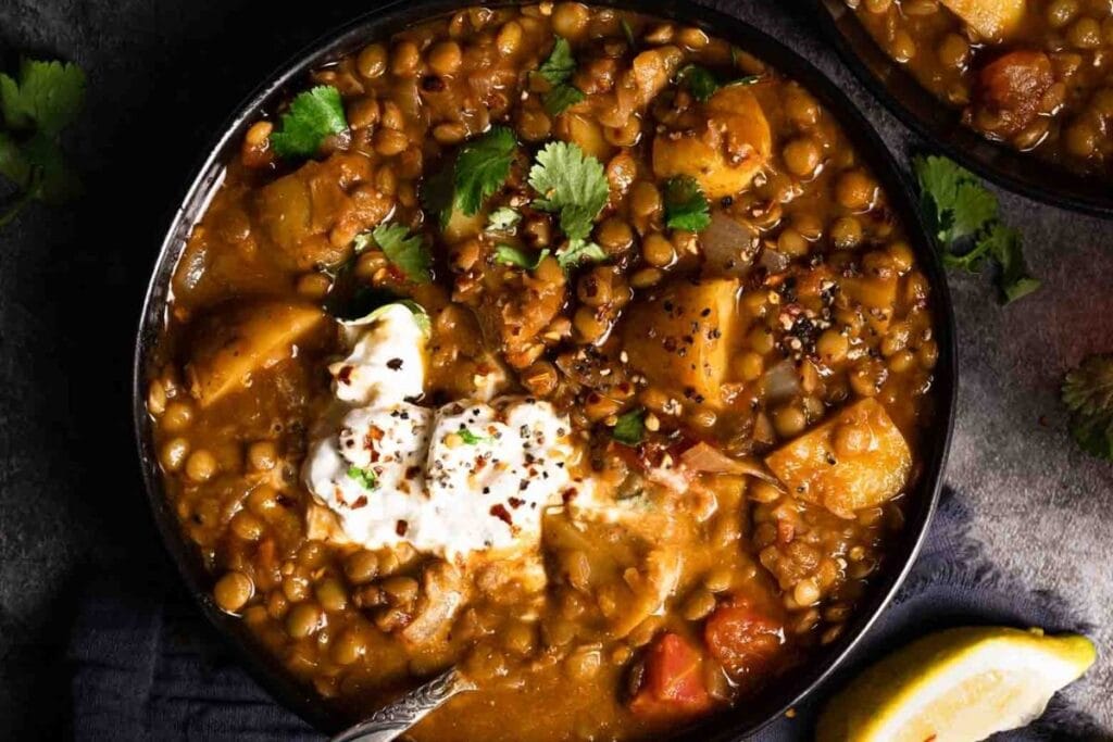 A bowl of lentil potato soup.