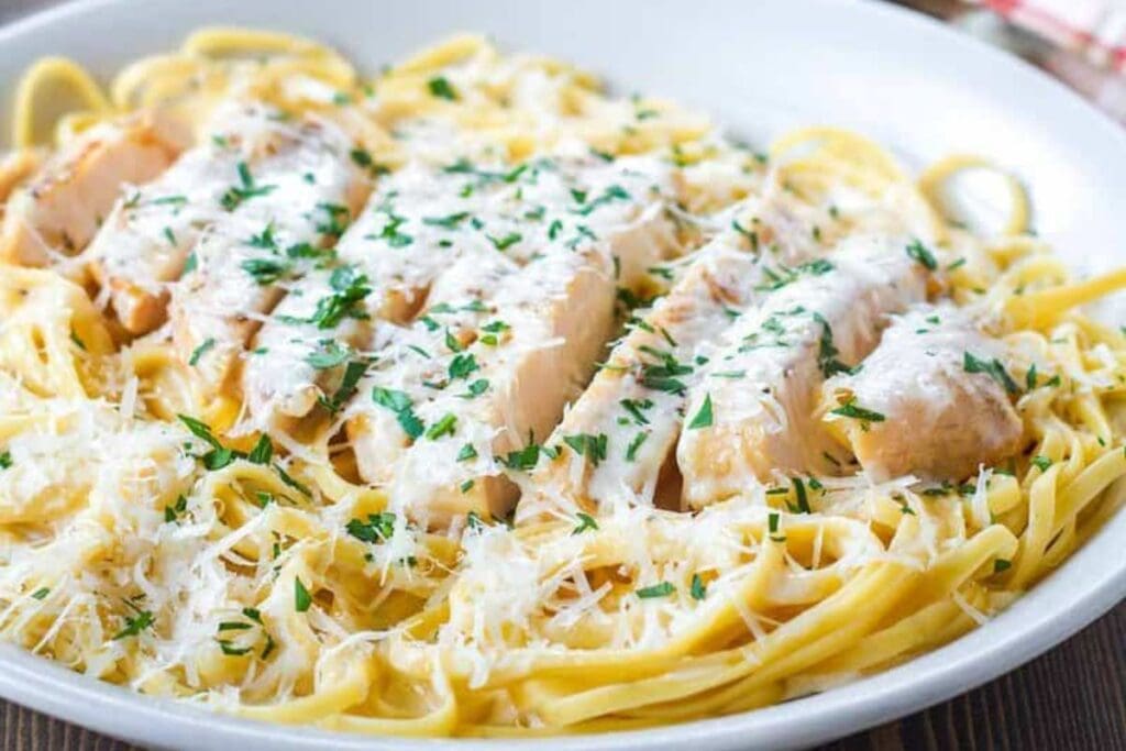 Pasta with chicken on a plate.