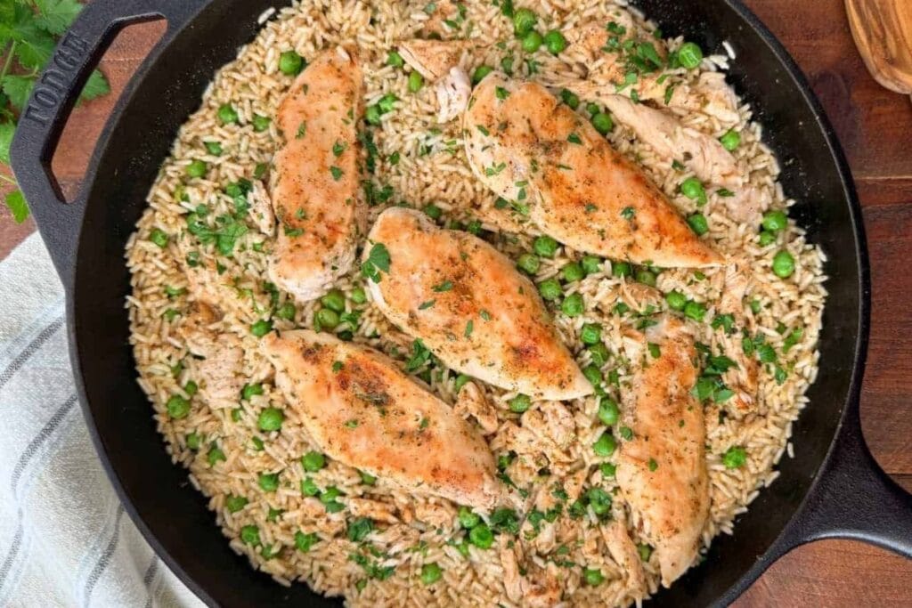 Chicken and rice in a pan.