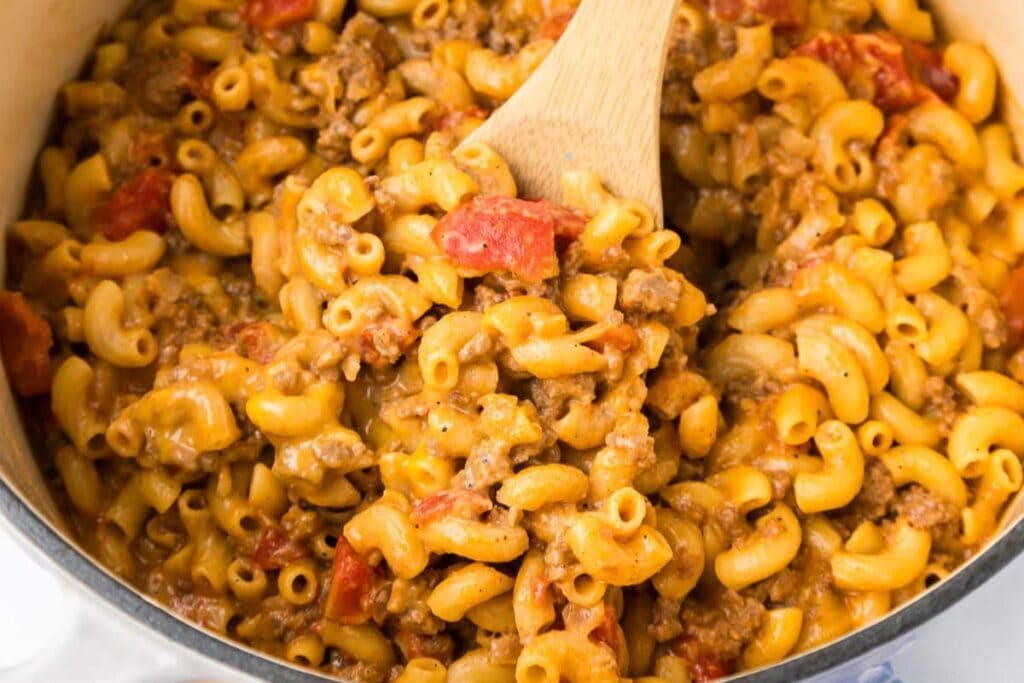 A spoonful of cheeseburger pasta.