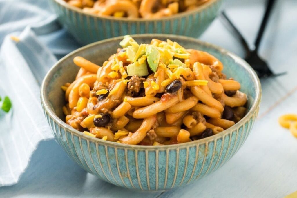 A bowl of cheesy taco pasta.