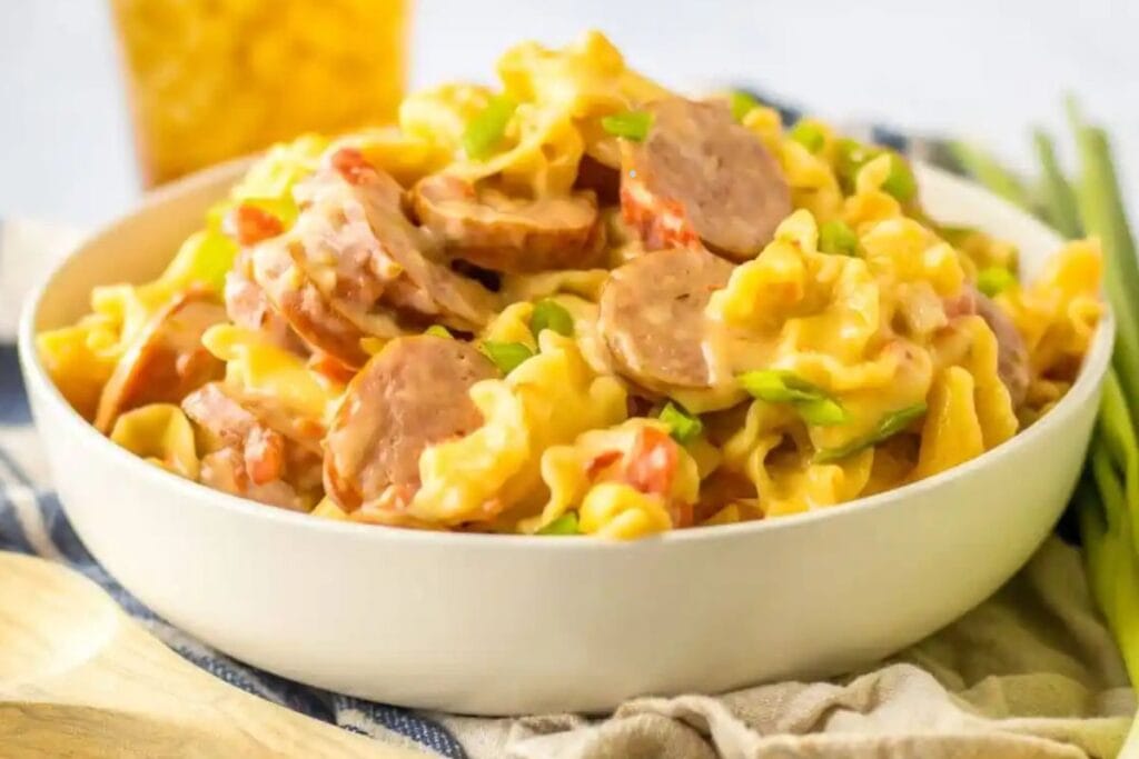 A bowl of sausage pasta.