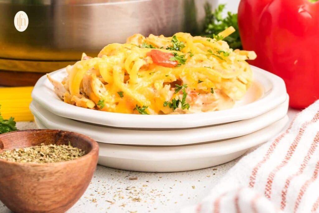 Chicken spaghetti on a plate.