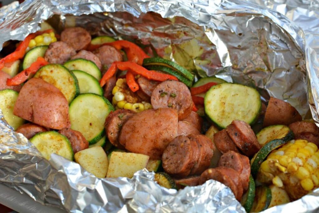 Sausage and veggies in foil packet.