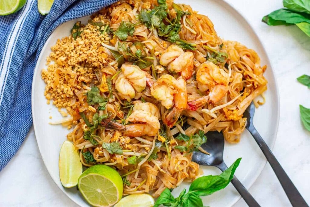 Shrimp pad thai on a plate.
