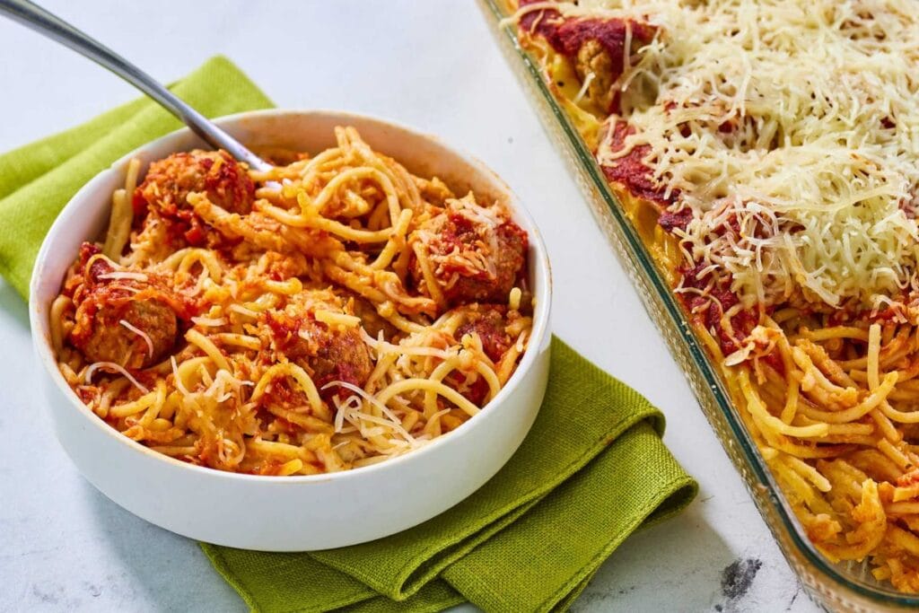 A bowl of meatball casserole.