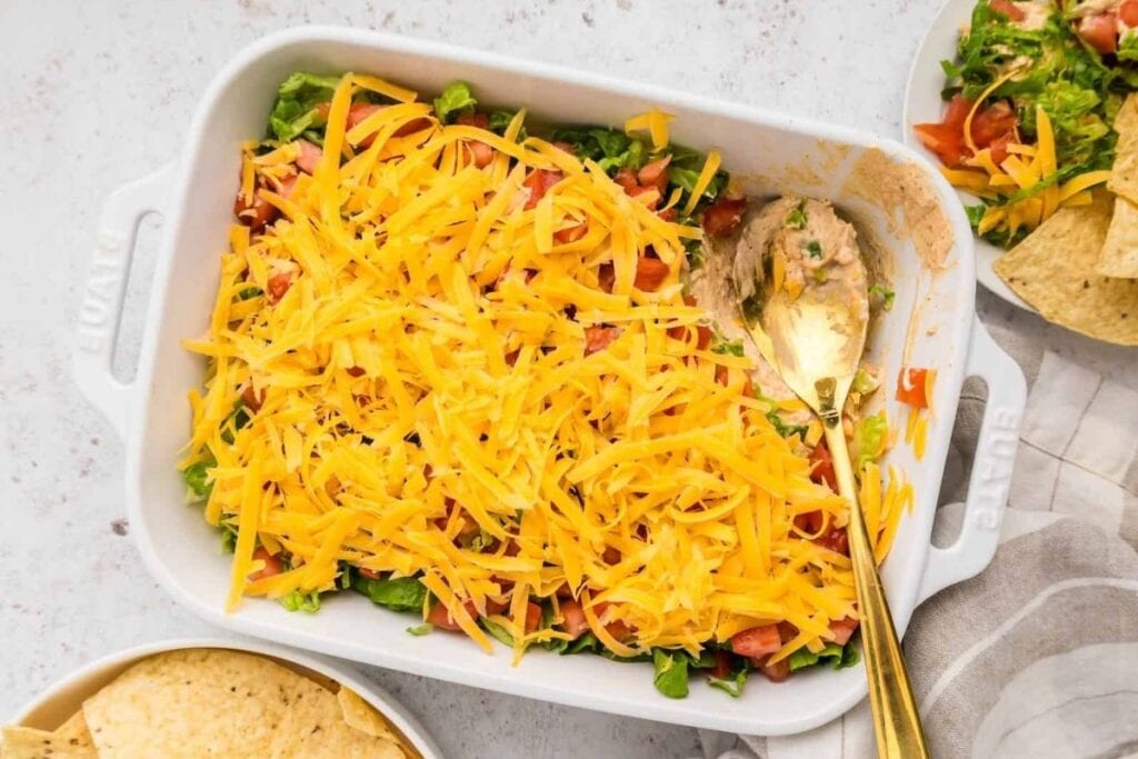 Taco dip in a white dish.