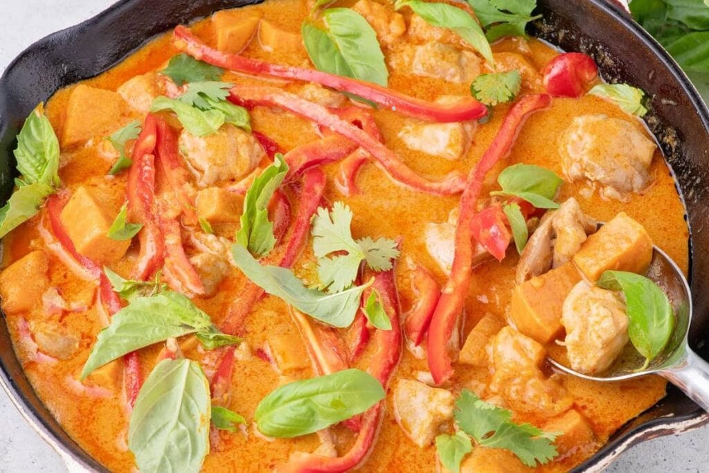 Red curry in a pan.