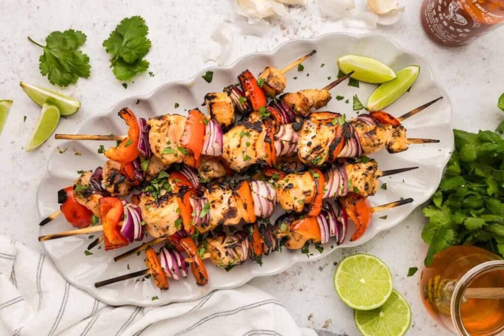Grilled Chicken Kebabs on a white plate.