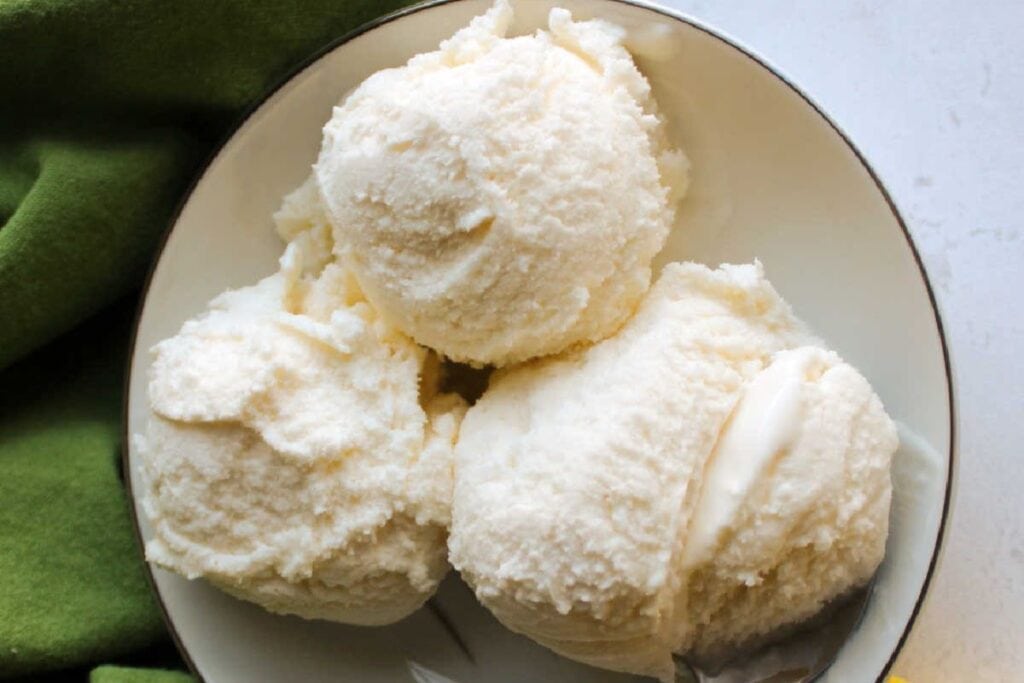 Lemon ice cream in a bowl.
