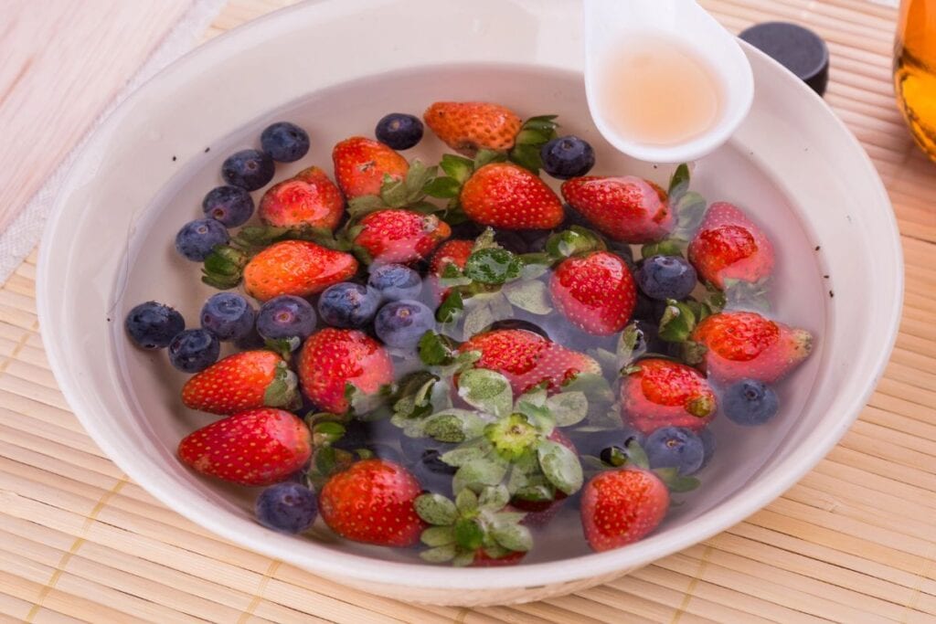Berries soaking in vinegar.