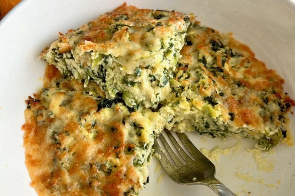 Sliced quiche in a white bowl.