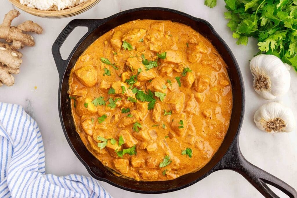 Chicken curry in a pan.