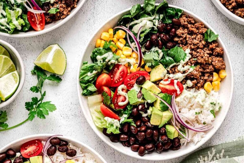 Taco bowl on a white surface.
