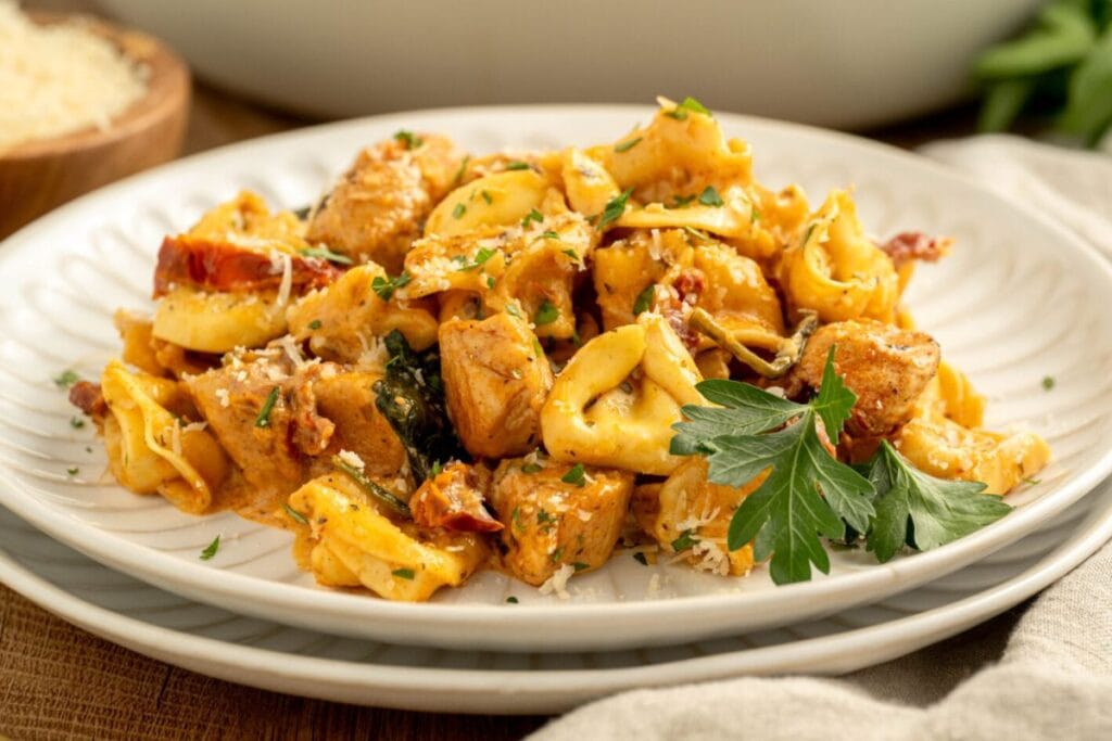 Chicken tortellini on a plate.