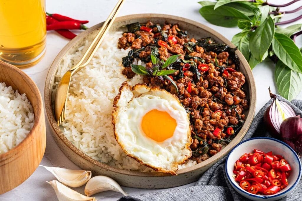 Rice, pork and egg in a bowl.