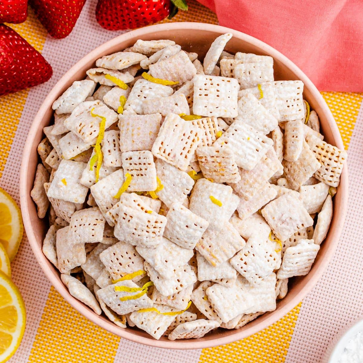 Strawberry lemonade chex mix in a pink bowl.