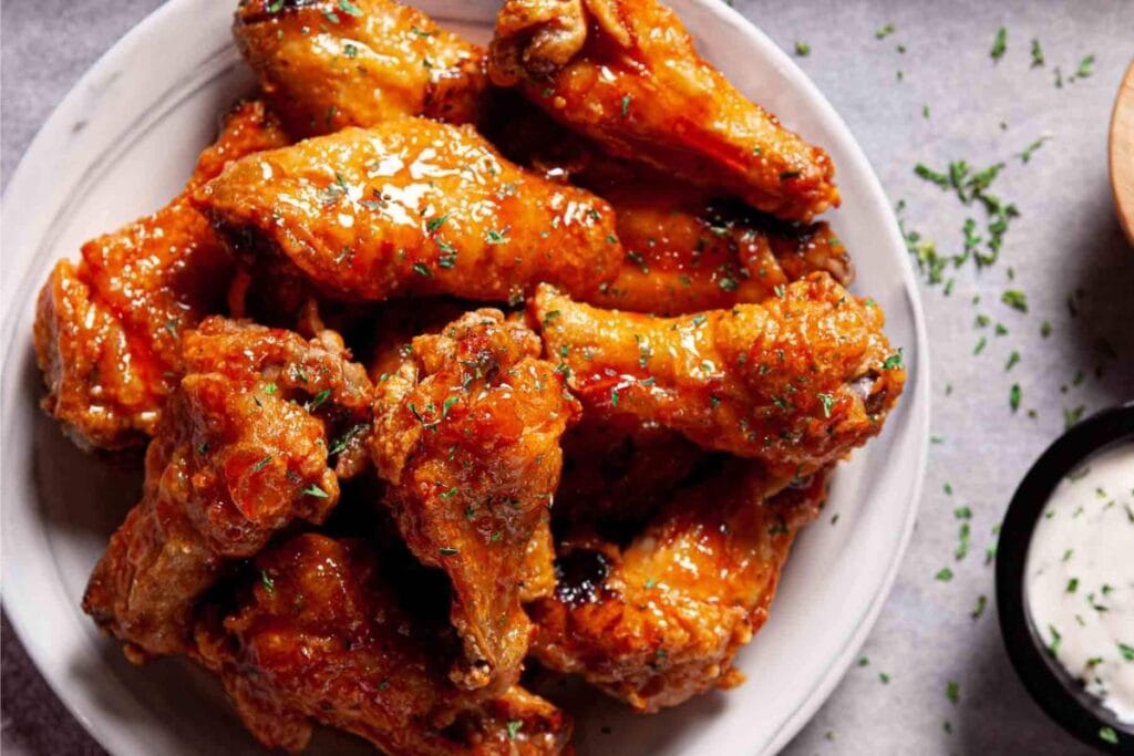 Chicken wings on a plate.