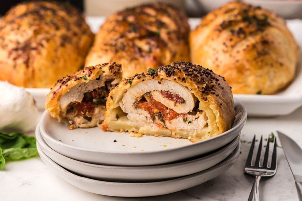 Puff pastry chicken on a plate.