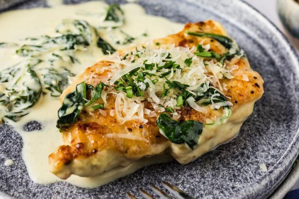 Chicken florentine on a plate.