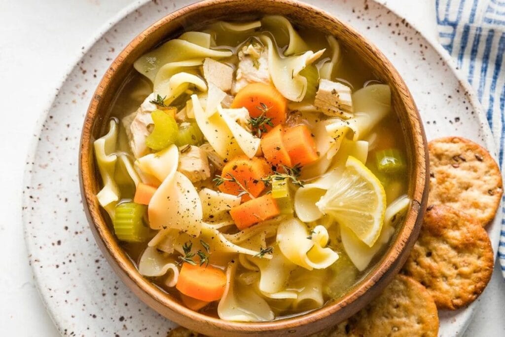 A bowl of chicken noodle soup.