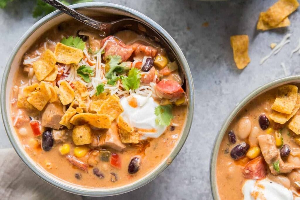 Two bowls of chicken soups.