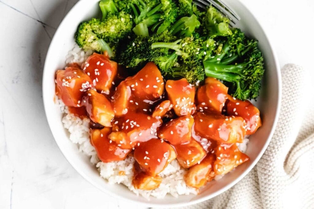 A bowl of orange chicken.