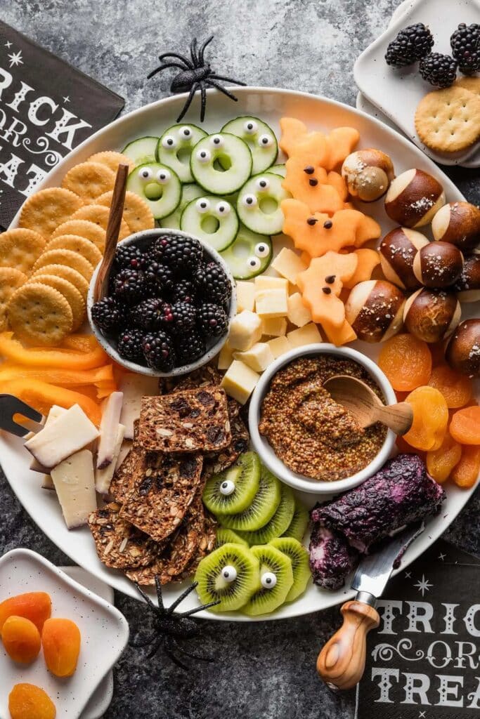 Close up shot of fruit and cheese board.