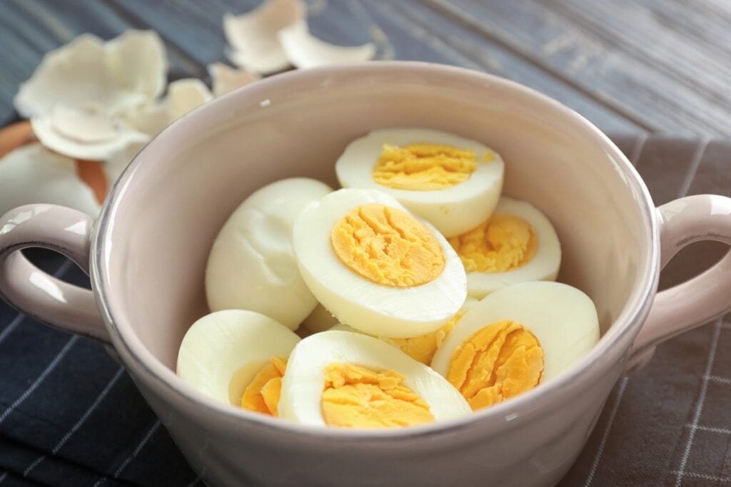 Hard-boiled eggs on table.
