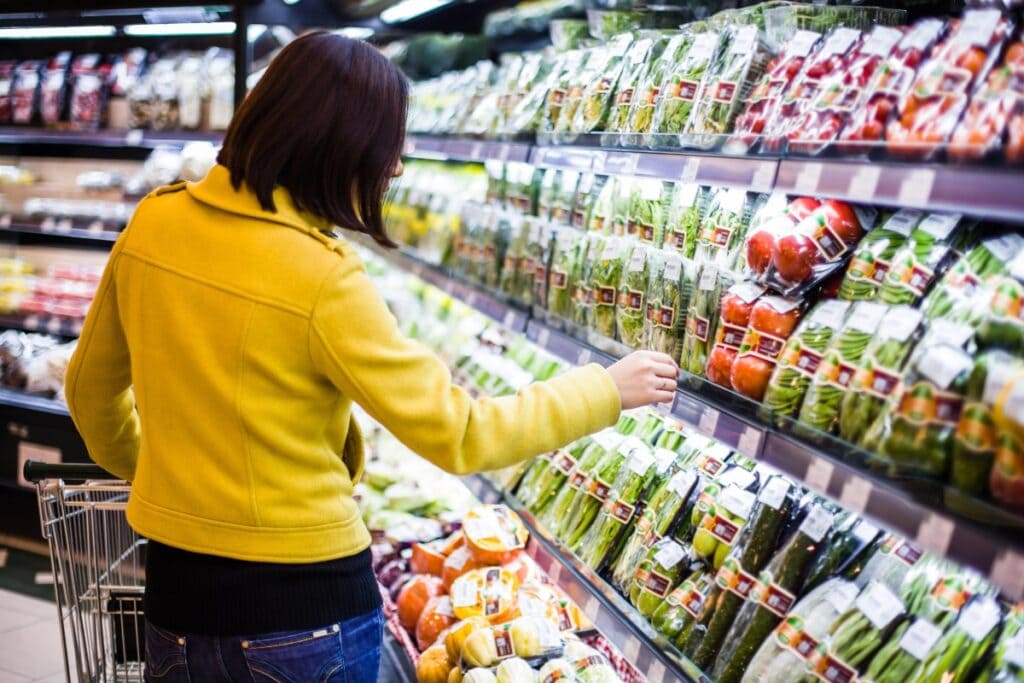 Woman grabbing item without looking at price.