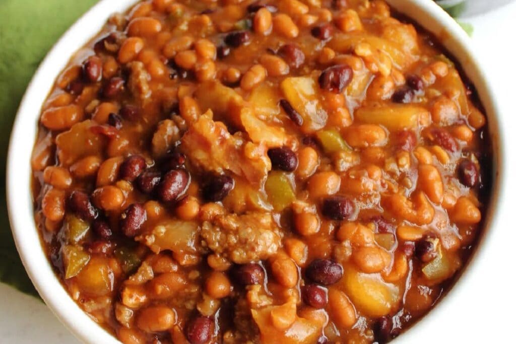 A bowl of baked beans.