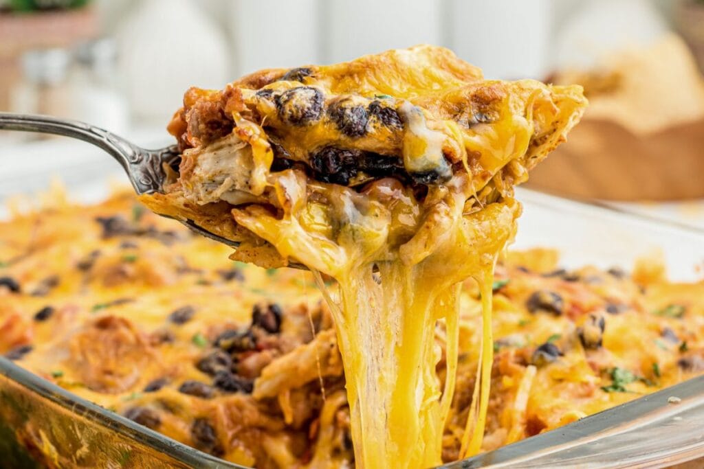 Chicken casserole with pulled cheese.
