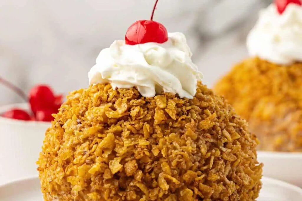 Fried ice cream with cherry on top.