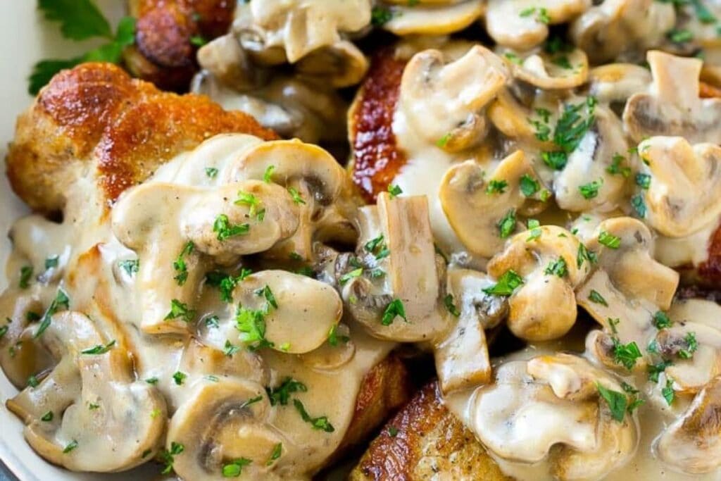 A close up shot of mushroom pork chops.
