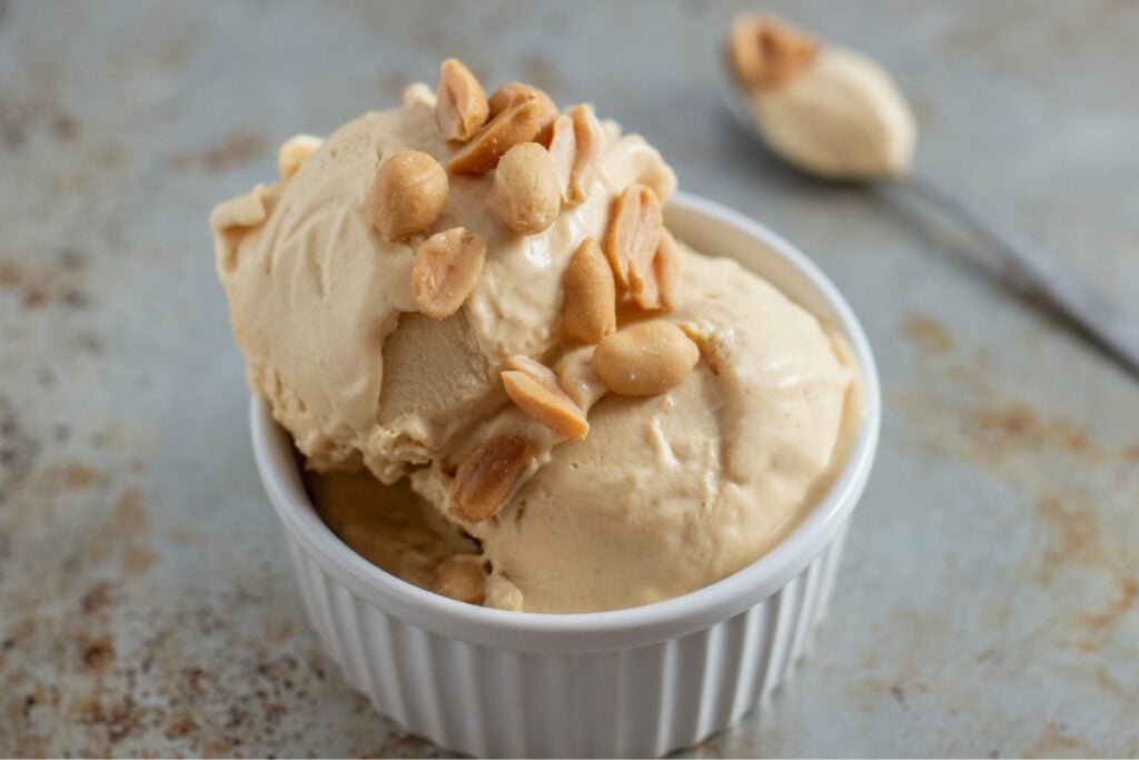 A closeup of peanut butter ice cream in a bowl.