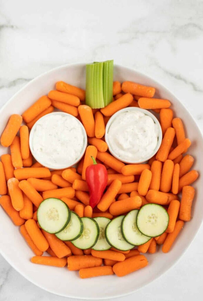 Pumpkin veggie tray in a bowl.