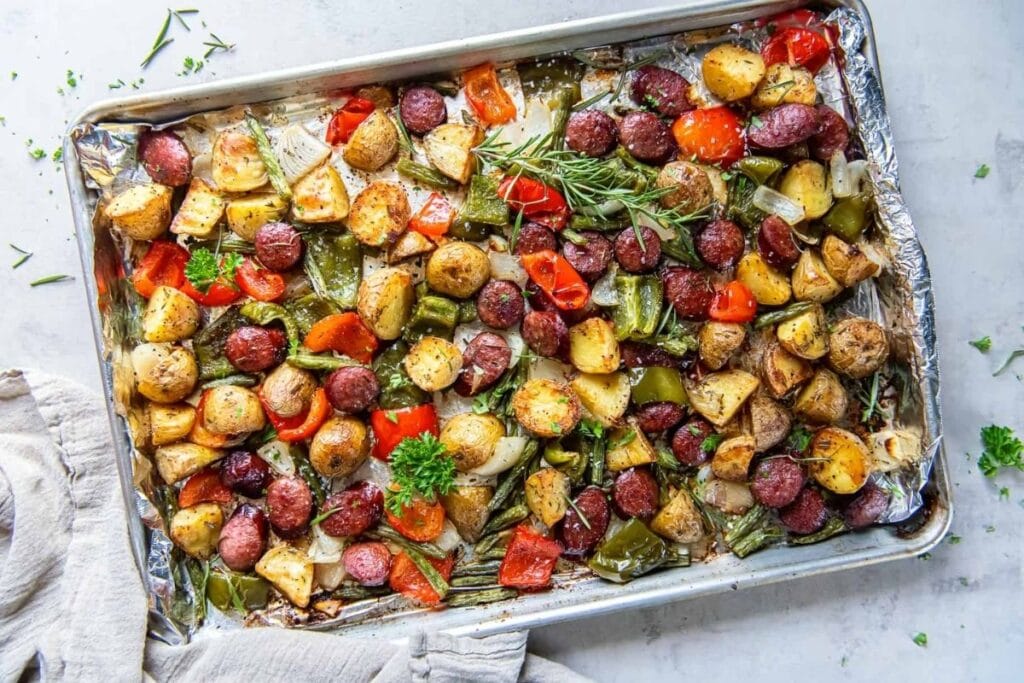 Sausage and potatoes on a sheet pan.