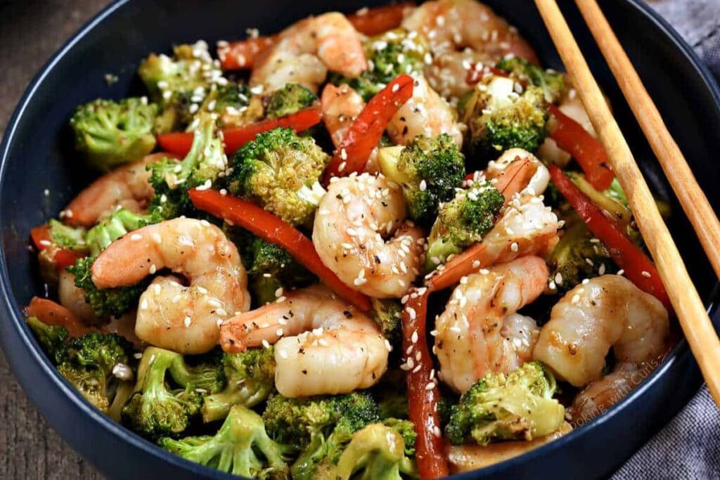 A bowl of shrimp stir fry.