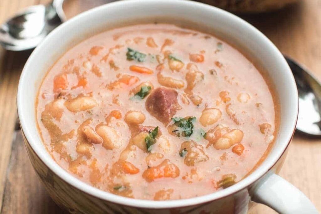 Ham and bean soup close up shot.