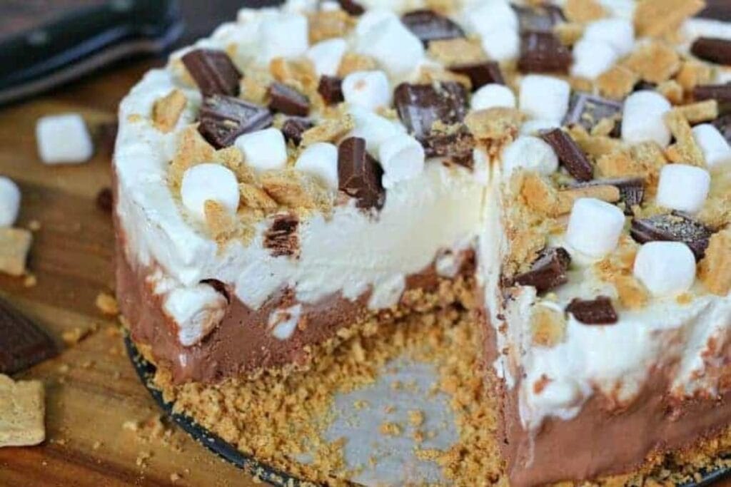 Ice cream cake with a slice.