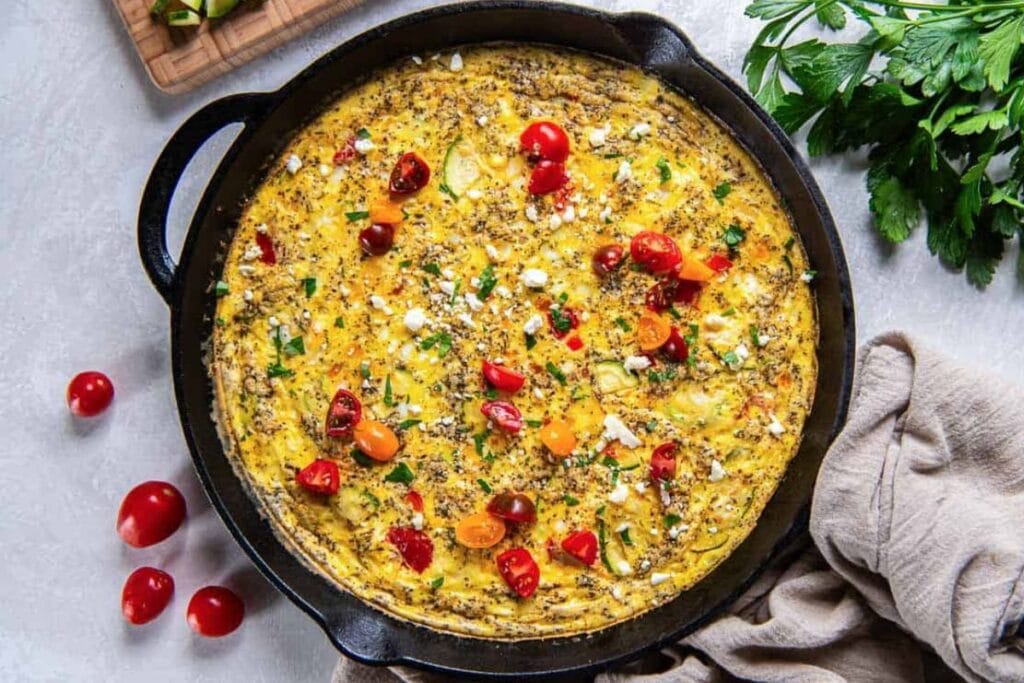 Zucchini fritata in a pan.