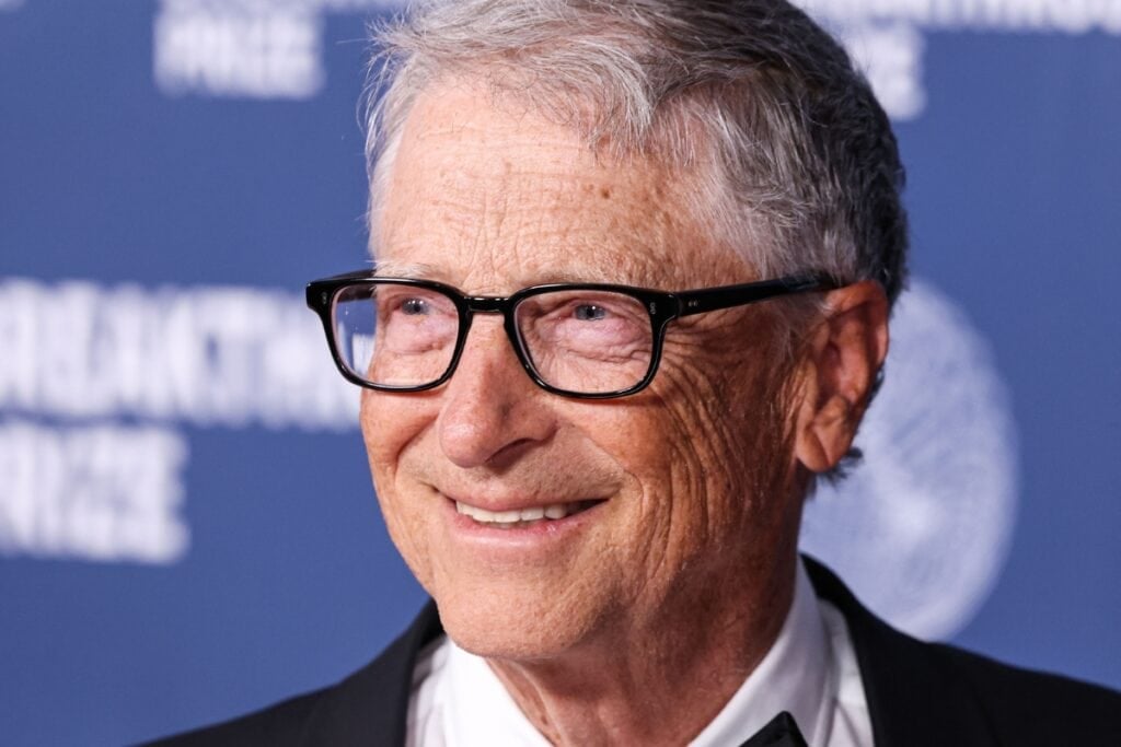Focused image of Bill Gates in a suit and glasses.