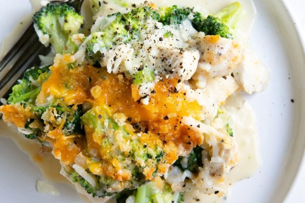 Chicken broccoli rice casserole on a white plate.