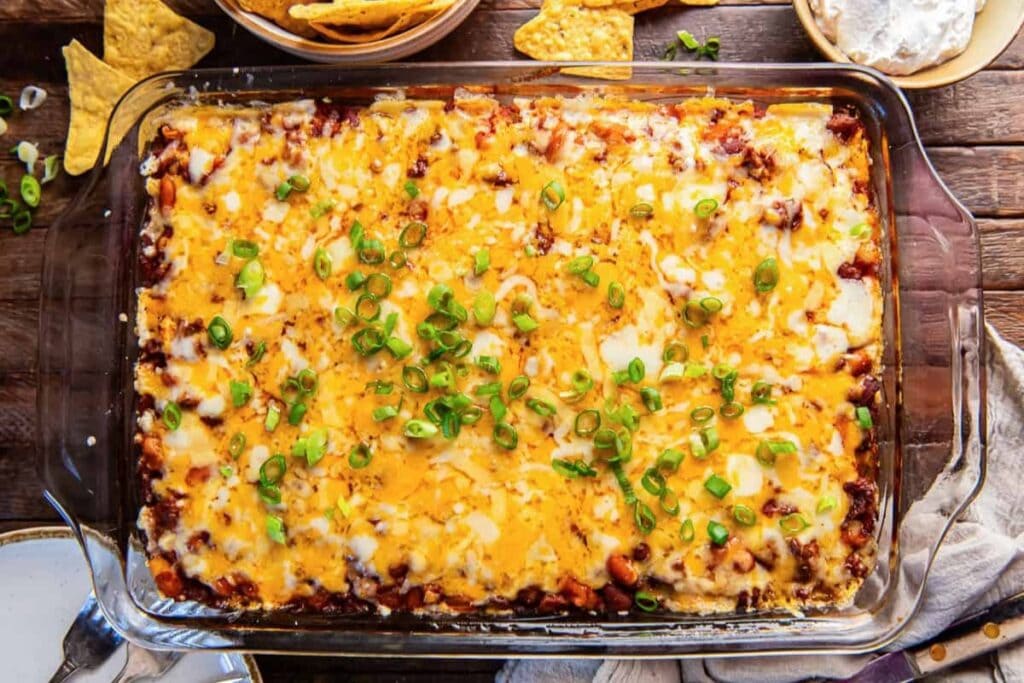 Chili cornbread bake in a white bowl.