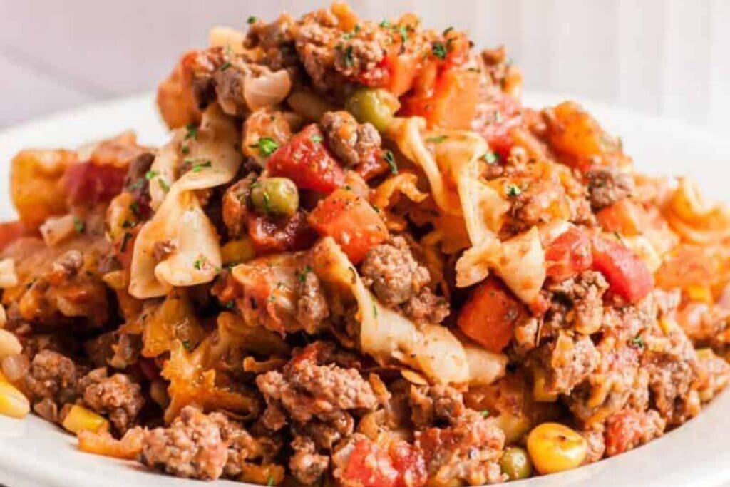 Hamburger casserole in a white plate.